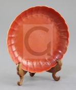 A Chinese coral red ground petal lobed saucer dish, Republic period, bearing an underglaze blue