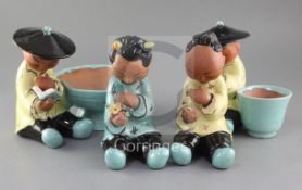 Gudrun Baudisch (1907-1982). A set of four Wiener Werkstatte tin glazed terracotta figures of