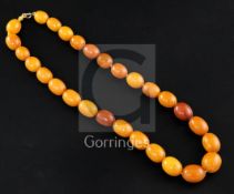 A single strand amber bead necklace, gross 53 grams, 46cm.