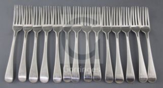 A set of fourteen George III silver Old English pattern table forks by Thomas Wallis II, with