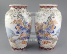 A pair of Japanese Imari ovoid vases, by Fukagawa, Meiji period, each finely painted with fish in