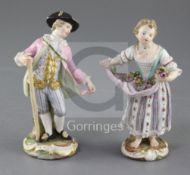 Two Meissen figures of gardeners, late 19th century, the gentleman holding a pole handle, the lady