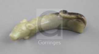 A Chinese yellow and black jade carving of a dog, Song dynasty or later, the hounds elongated body