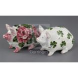 Two Wemyss models of pigs, early 20th century, the first decorated with cabbage roses, inscribed