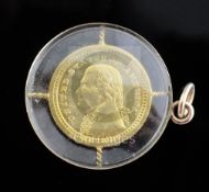 A United States of America 1903 'Louisiana Purchase Exposition, St. Louis' gold coin, encased in