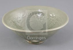A large Chinese moulded Yaozhou celadon bowl, Jin dynasty (1115-1234), of conical shape, the