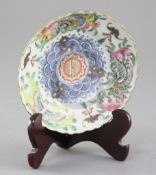 A Chinese famille rose saucer dish, late 19th century painted with butterflies and fruit to the