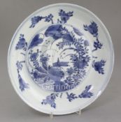 A Chinese kraak blue and white dish, c.1680-1700, finely painted to the centre with a grasshopper