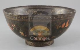 A Persian painted papier mache bowl, 19th century, the exterior painted with scenes of hunting,