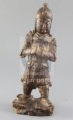 A Chinese carved wood figure of a warrior, Ming dynasty, height 31.2cm, old losses and age cracks