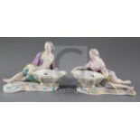 A pair of Meissen figural salts, late 19th century, modelled as a recumbent lady and gentleman