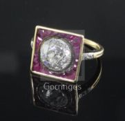 A 1920's/1930's gold, single stone diamond and ruby tablet dress ring, the single stone weighing