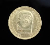 A Russian Nicholas II five rouble gold coin, 1904 St Petersburg mint, 4.3g, GVF