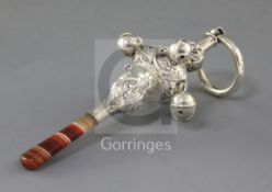 A late Victorian silver child's rattle by Crisford & Norris, with silver teether, six bells and