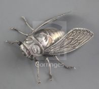 A Japanese silver articulated model of a cicada, by Muneyoshi, Meiji period, the insect with fully