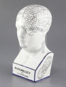 An L. N. Fowler pottery phrenology head, late 19th century, the cranium divided into various regions