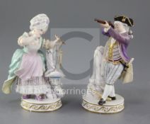 A pair of Meissen figures of a lady and gentleman, 19th century, after the model by Acier, the