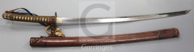 A WWII Japanese officer's katana, with ray-skin handle and brown leather covered scabbard, the