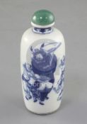 A Chinese blue and white ovoid snuff bottle, 19th century, painted with the figures of Zhong Kui and