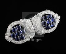 A 1960's? white gold, sapphire and diamond double clip brooch, set with round and baguette cut