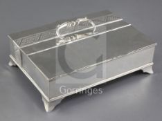 An Edwardian silver rectangular treasury inkstand by Carrington & Co, with engraved stylised band,