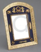 A 19th century French Empire ormolu mounted easel frame toilet mirror, the frame cast with palmettes