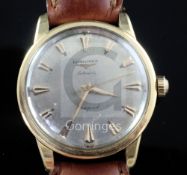 A gentleman's 1950's/1960's 18ct gold Longines Conquest automatic wrist watch, with arrowhead