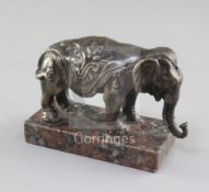 A 19th century bronze model of an elephant, on rouge marble plinth, length 4.75in. height 3.25in.