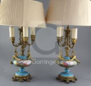 A pair of Sevres style porcelain and ormolu mounted table lamps, late 19th century, each painted