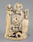 A Japanese ivory okimono of boys clambering on an elephant, Meiji period, the boys performing