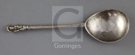 A mid 17th century apostle spoon, with later? prick dot initials and date (1674), three indistinct