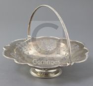 A Victorian pierced silver fruit basket, by Martin, Hall & Co, with engraved decoration and beaded