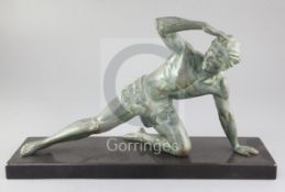 Jean de Roncourt. A bronzed metal figure of a fallen warrior, on signed black marble plinth, width