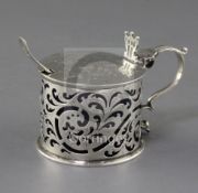 A William IV engraved silver drum shaped mustard by Edward Farrell, with pierced scroll