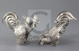 A pair of late 19th/early 20th century German Hanau naturalistically cast 800 standard silver models