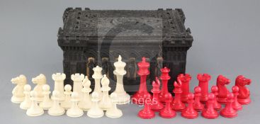 A Jaques of London Staunton carved and stained ivory chess set, with original papier mache box and