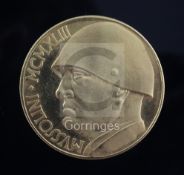 An Italian 100 Lire proof gold coin, 1943 Mussolini pattern, 31.9g