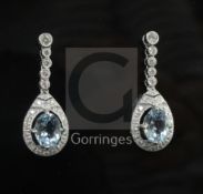A modern pair of 18ct white gold, aquamarine and diamond set drop earrings, 28mm.