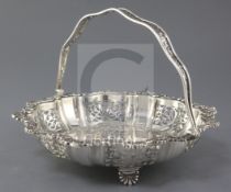 A George V silver fruit basket by Alexander Clark & Co. Ltd, of shaped circular form, with