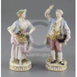 A pair of Meissen figures of gardeners, late 19th century, the gentleman holding flower in his hat