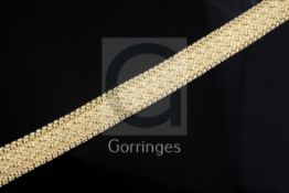 A French textured 18ct gold mesh link bracelet, 19.7cm.