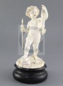 A 19th century Dieppe carved ivory figure of a putto holding a dead deer, on naturalistic base