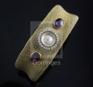 A lady's 18ct gold, cabochon amethyst and diamond set Zenith manual wind bracelet watch, with