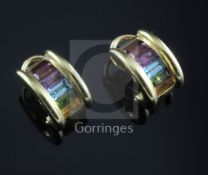A pair of modern 18ct gold and multi gem set half hoop earrings, set with baguette cut stones and