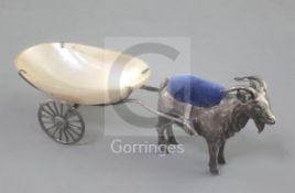 An Edwardian novelty silver billy goat and cart pin cushion, with mother of pearl cart on two