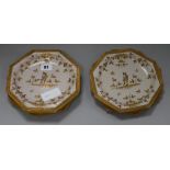 Seven octagonal faience plates