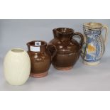 Two sussex pottery jugs and another 19th century jug and a vase