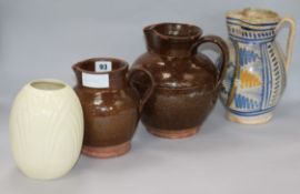 Two sussex pottery jugs and another 19th century jug and a vase