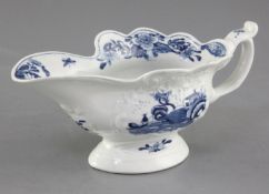 A Worcester Triangular Platform pattern blue and white sauceboat, c.1755, the crest moulded wavy