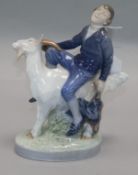 A Royal Copenhagen figure of 'Hans Clodhopper', boy riding a goat, No. 1228 height 18cm